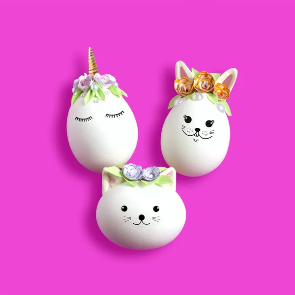 Handmade unicorn, bunny and cat made of egg. Creative Easter decor, kawaii style. Minimal easter concept