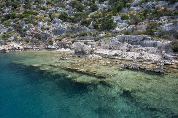 A section of the Sunken City of Simena on Kekova Island in Turkey. The city sank into the Mediterranean Sea after a series of earthquakes in the 2nd century AD.