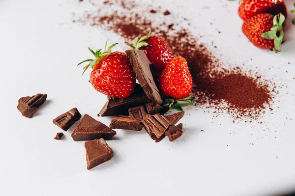 Dessert sweet strawberries with chocolate and what on a white background. Top view — Stock Photo, Image