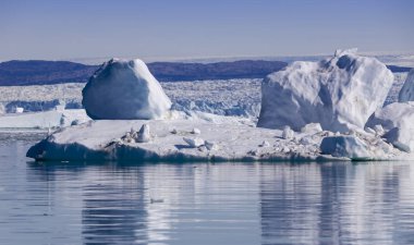 Ices and icebergs of unusual forms. Research of polar regions of Earth. Phenomenon of global warming. Catastrophic thawing of glaciers of the planet. clipart