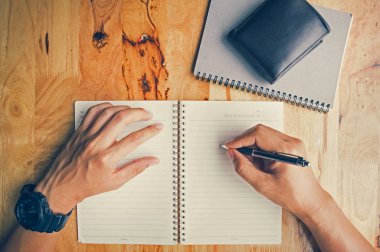 Üst te. El yazma kitapları cüzdan ve defter bir woo yerleştirilir