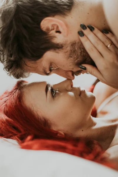 Beautiful Loving Couple Kisses Bed — Stock Photo, Image