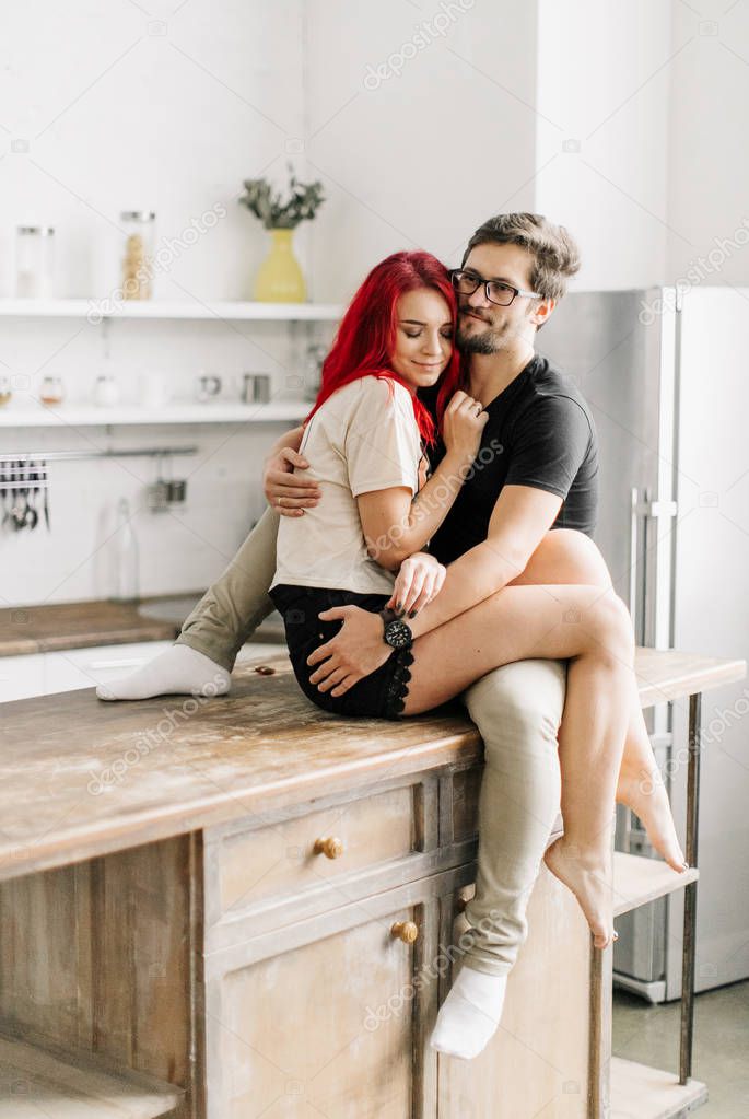  beautiful loving couple in the kitchen