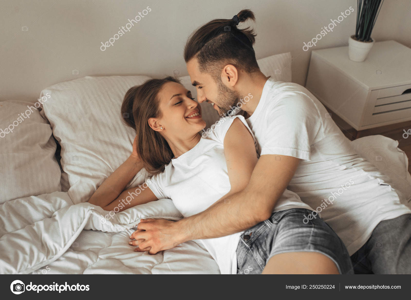 See more of couple pictures on facebook. beautiful loving couple kissing bed stock photo image by c kapitonenko 250250224