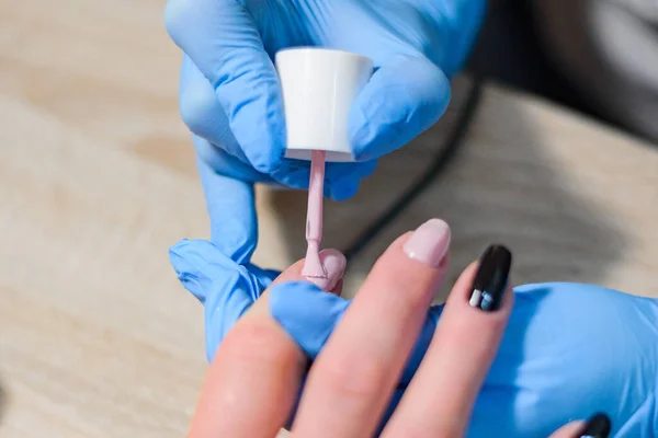 manicure, extension and design of nails with gel