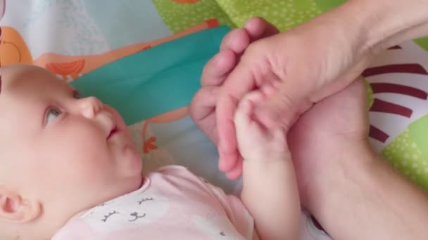 Happy Parents Play Newborn Daughter Age Two Months Ths Father — Stock video