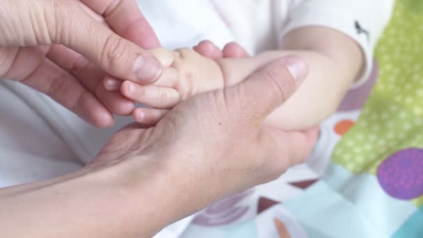 Mother Holding Her Newborn Daughter Hand Mom Her New Born — Stock Video