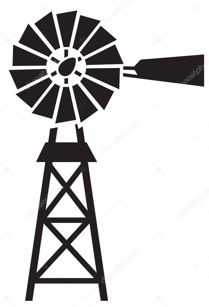 silhouette of a water pumping windmill