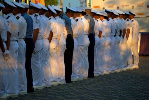 Cadets of the naval school of Panama in format at sunset, in Ciudad de Panama.