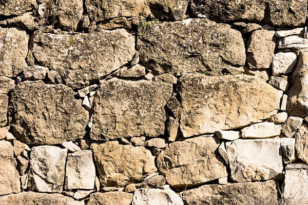 Ancient stone wall in a rural zone. Old stones texture. Dry stone "pedras Seca" . Outdoors txtured. — Stock Photo, Image