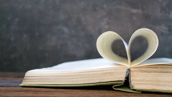 Open Book Heart Shape Paper Page Dark Wood Table Love — Stock Photo, Image