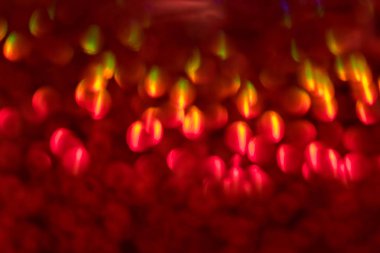 Ufuk kırmızı parlak ışıklar arka plan. Bokeh Noel ışık arka plan bulanık. Holiday xmas parlak zemin. 