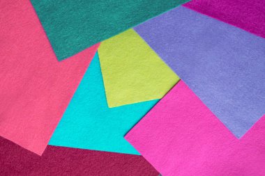 Yumuşak keçe örnekleri farklı renk kanatlar. Renkli parlak hayranı tekstil malzeme hissettim. Zanaat soyut el sanatları arka plan el yapımı ve yaratıcı için hissettim. Pop sanat arka plan