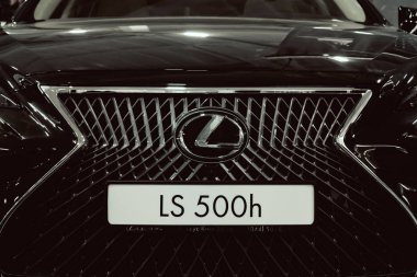 Lexus new car at motor show, Automobile Salon. Lexus LS 500h  new flagship luxury sedan, selective focus