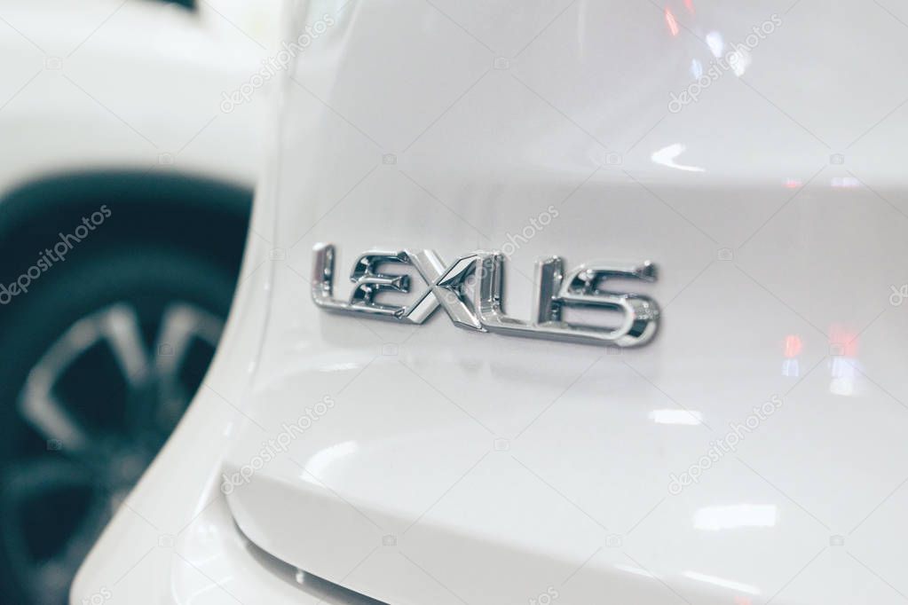 Close up Lexus metac logo closeup on the Lexus car at motor show, Automobile Salon. Lexus new luxury car, selective focus