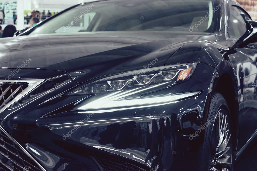 Lexus new car at motor show, Automobile Salon. Lexus LS 500h  new flagship luxury sedan, selective focus