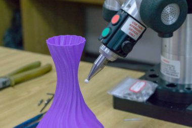 3D Measurements device measures 3D printed plastic part. 3D scan clipart