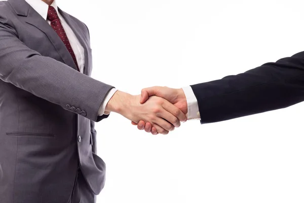 Бизнесмен пожимает руку другому бизнесмену или партнеру за экономическое сотрудничество, поздравления, этикет, приобретение, сделку по бизнесу, слияние. Это традиция бизнеса, когда встречаешь друг друга — стоковое фото