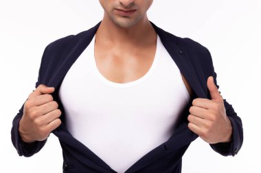 Takım elbiseli bir iş adamı, beyaz arka planda izole edilmiş bir süper kahraman gibi davranıyor. Yakışıklı genç işadamı kendinden emin ve kararlı olur. Çekici adam sıkı çalışmaya hazır. O cesur bir adam.