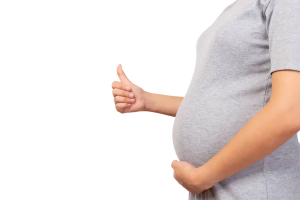 怀孕的母亲抱着肚子和放弃大拇指与孤立的白色背景复制空间 怀孕妇女及其婴儿或胎儿健康状况良好 用于广告 保险概念 — 图库照片