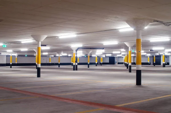 Under ground empty, illuminated car park floor