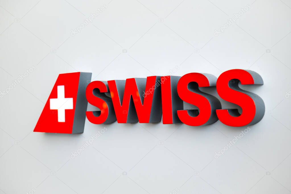 Zurich Airport, Switzerland, August 25, 2025. Swiss airline company logo inside airport terminal, no people