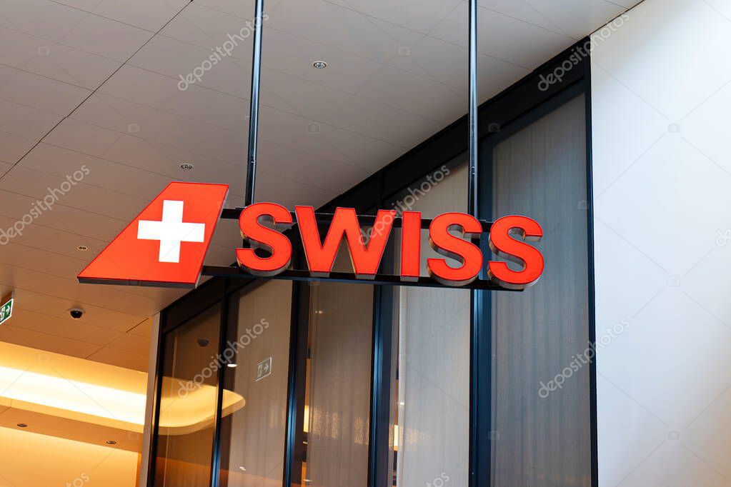 Zurich Airport, Switzerland, August 25, 2025. Swiss airline company logo inside airport terminal, no people