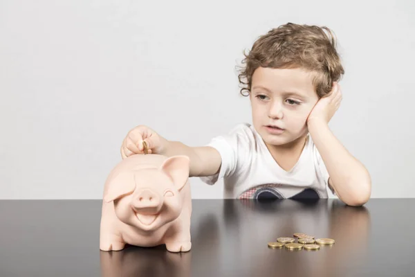 Child Inserting Coins Piggy Bank — Stock Photo, Image