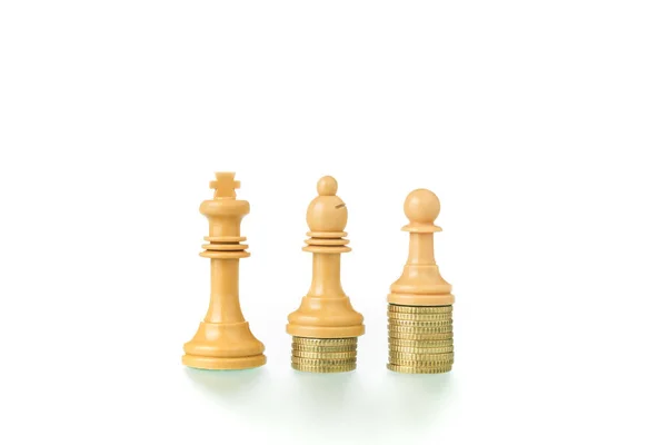 Conceptual photo with chess pieces and coins showing the concept — Stock fotografie