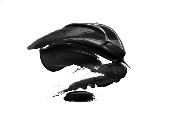 Teinture volumétrique noire grasse dessinée à la main sur un fond blanc isolé — Photo