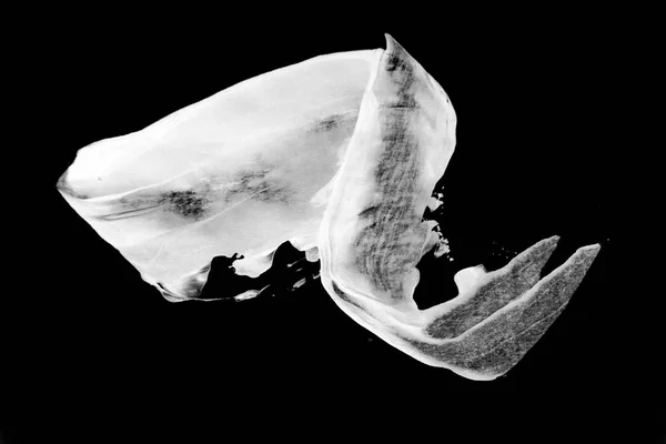 Κηλίδες λευκής μπογιάς σε μαύρο φόντο — Φωτογραφία Αρχείου