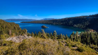 Stunning panoramic view of Emerald Bay and Fannette Island from a scenic overlook at Emerald Bay State Park, South Lake Tahoe, California clipart