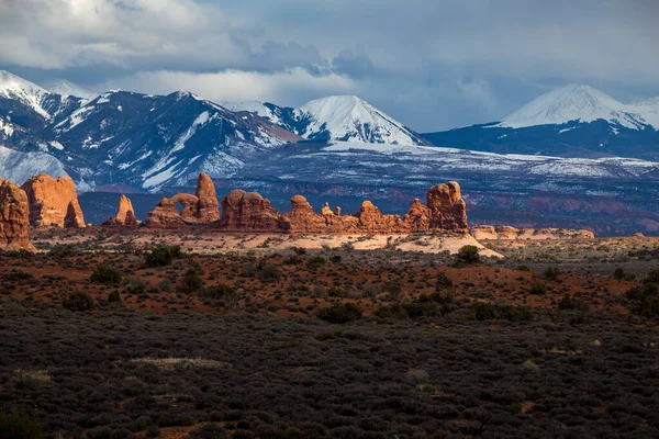 Colorful View Parade Elephants Sandstone Rock Formations High Desert Snowcapped Royalty Free Stock Photos