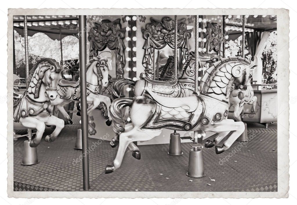 Old fashioned french carousel with horses Vintage Monochrome photo