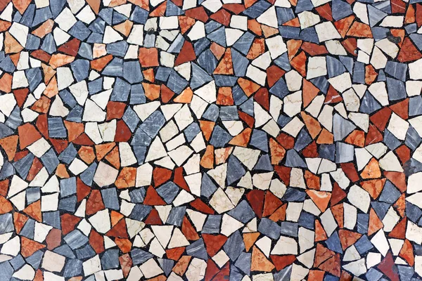 Revestimento de mosaico de pedras pequenas multicoloridas — Fotografia de Stock