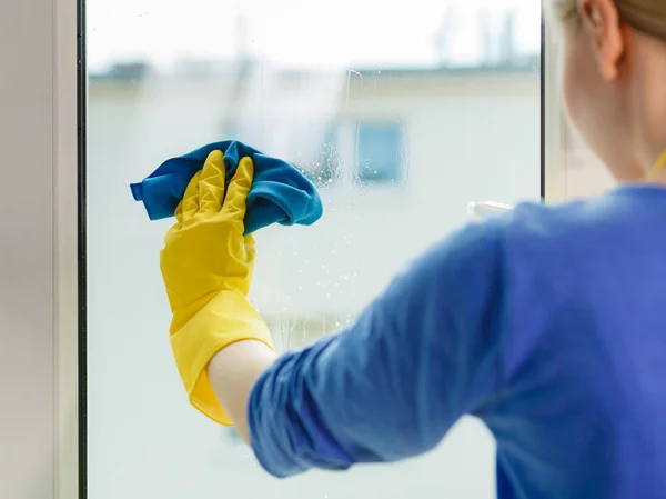 Young Woman Yellow Gloves Cleaning Window Blue Rag Spray Detergent — Stock Photo, Image