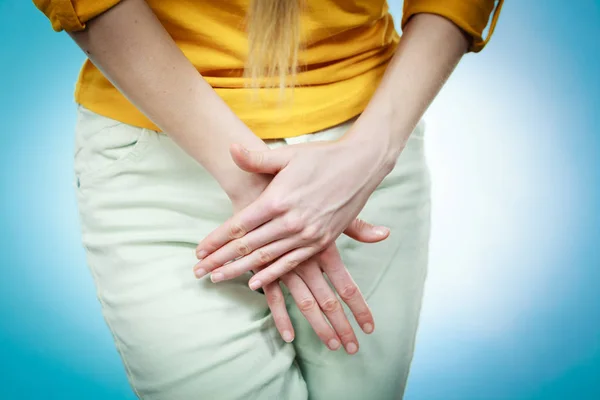 Part of body young sick woman with hands holding pressing her crotch lower abdomen. Medical or gynecological problems, healthcare concept — Stock Image Part Body Young Sick Woman Hands Holding Pressing Her Crotch Royalty Free Stock Images