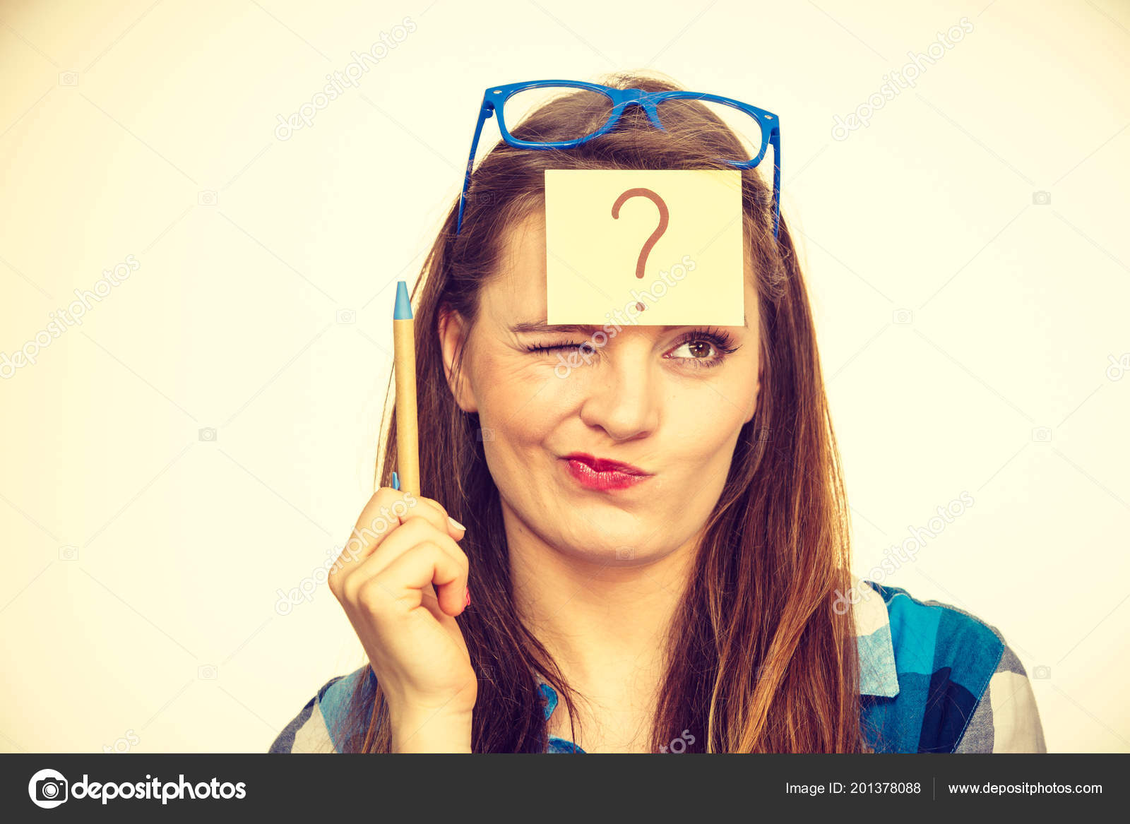 Thinking Woman Big Nerdy Eyeglasses Question Mark Forehead Beige Bright Stock Photo by