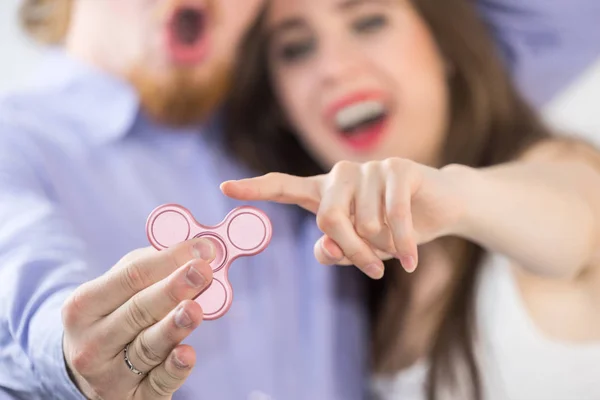 Millennials Couple Being Amazed Simple Toy Man Woman Playing Pink — Stock Photo, Image