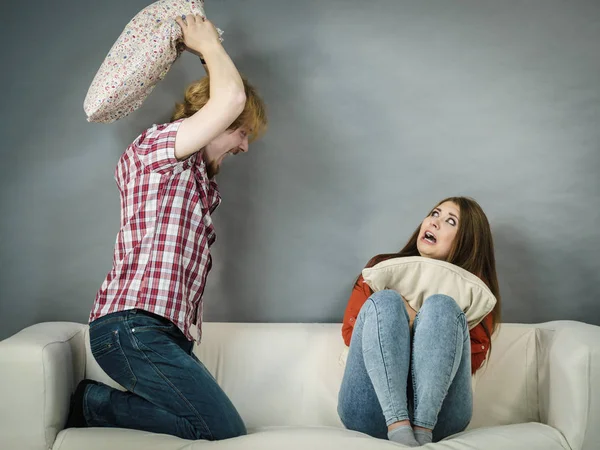 Brother Bullying Her Younger Teenage Sister Having Pillow Fight Siblings — Stock Photo, Image
