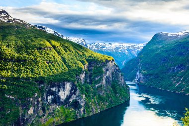 Tourism vacation and travel. Beautiful view over magical Geirangerfjorden from Flydalsjuvet viewpoint, Norway Scandinavia. clipart