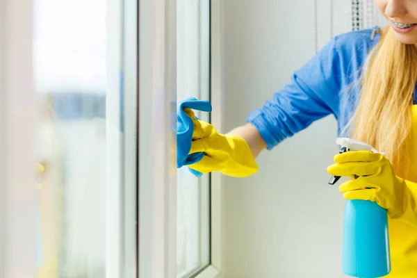 Young Woman Yellow Gloves Cleaning Window Blue Rag Spray Detergent — Stock Photo, Image