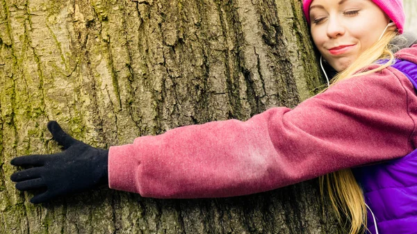 Woman Wearing Sportswear Giving Hug Embracing Tree Trunk Being Love — Stock Photo, Image