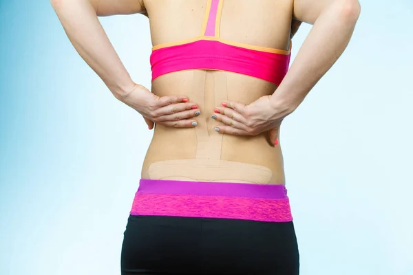 Woman Kinesiotaping Application Back Pain Backache Alternative Kinesio Tape Therapy — Stock Photo, Image