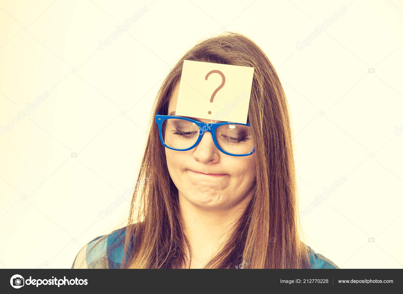 Thinking Woman Big Nerdy Eyeglasses Question Mark Forehead Beige Bright Stock Photo by