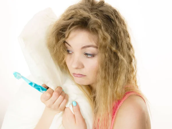 Sleepy Woman Blonde Tangled Hair Hugging White Pillow Holding Toothbrush — Stock Photo, Image