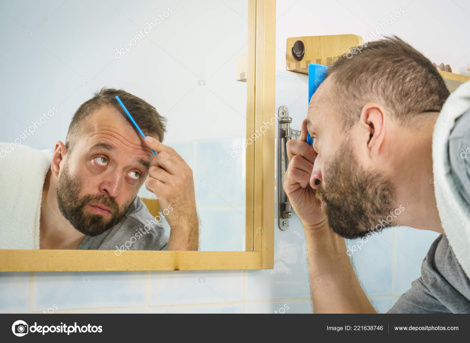 Adult Man Standing Front Bathroom Mirror Brushing His Short Hair