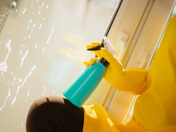 Female Hand Yellow Gloves Cleaning Window Blue Rag Spray Detergent — Stock Photo, Image