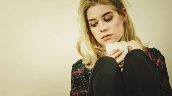 Sad Contemplating Woman Sitting Couch Alone Drinking Tea Coffee Mug — Stock Photo, Image