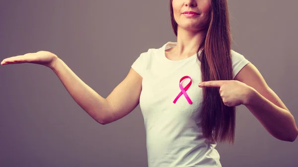 Woman Wih Pink Cancer Ribbon Chest Holding Open Hand Product — Stock Photo, Image